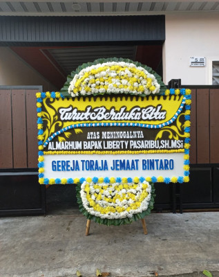 Papan Bunga Duka di Waringinsari